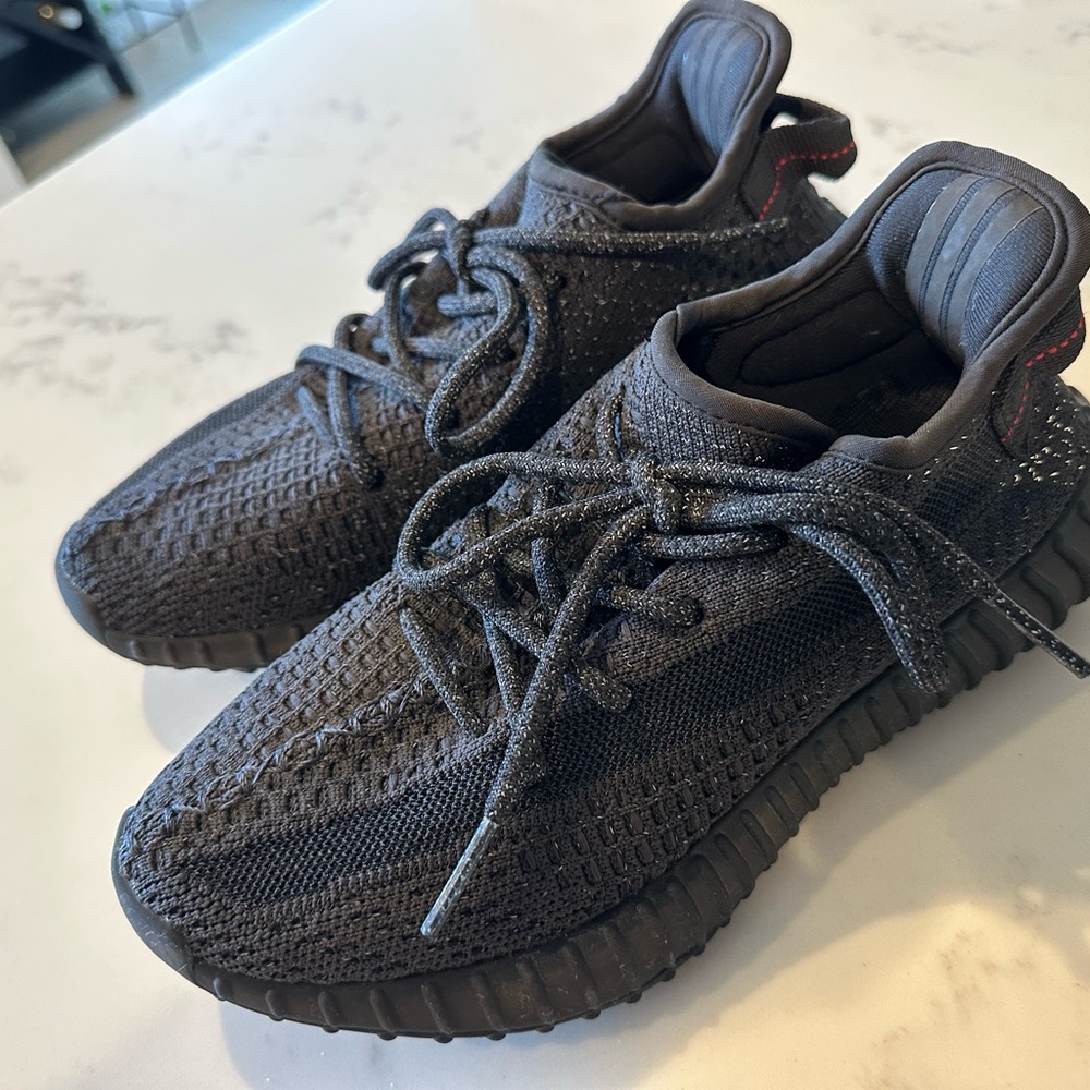 Adidas Black Sneakers with Knit Upper and Ribbed Midsole